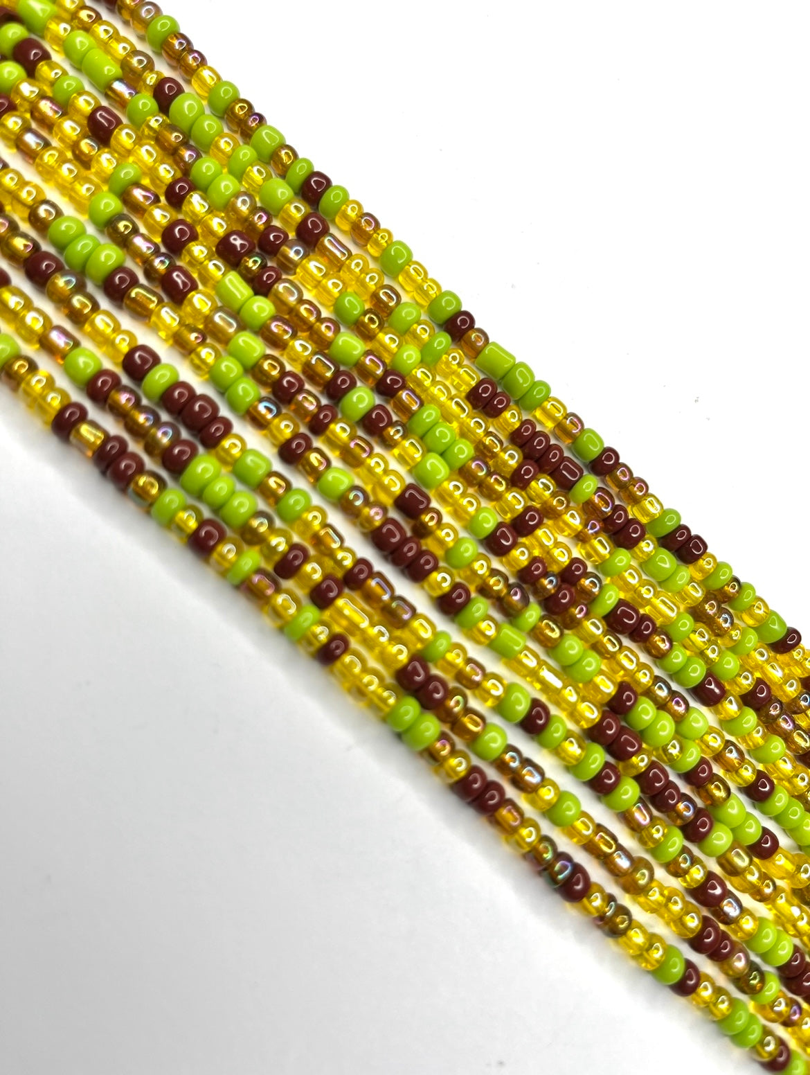 Photo of Garri traditional African tie on waist beads in gold standard size which fits most up to plus size. 